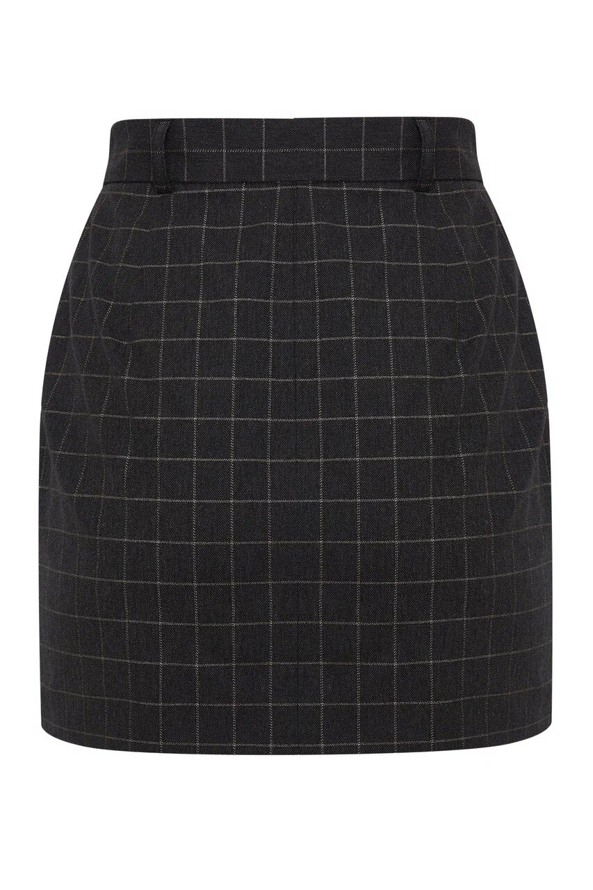 A mini skirt made of black fabric with a golden checkered pattern